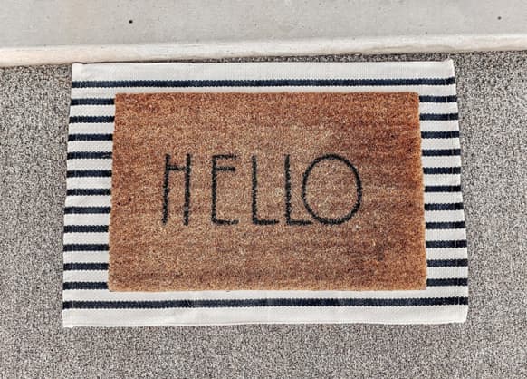 Layered welcome mats